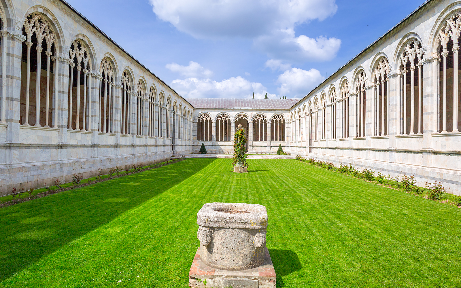 Pisa Camposanto cemetery with ancient frescoes and marble sculptures in Pisa, Italy.