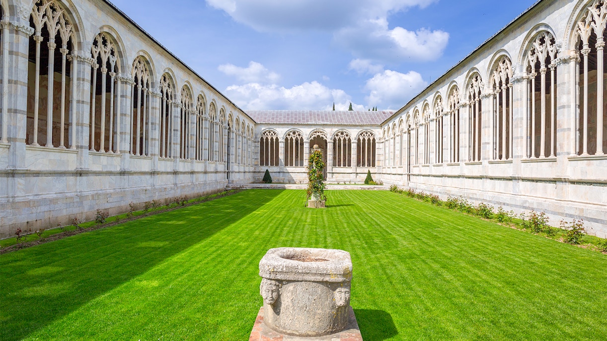 Pisa Camposanto cemetery with ancient frescoes and marble sculptures in Pisa, Italy.