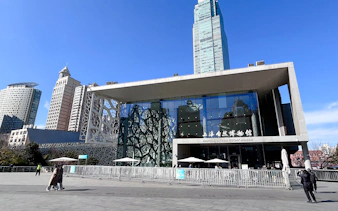 Shanghai Natural History Museum entrance with modern architecture, Shanghai.
