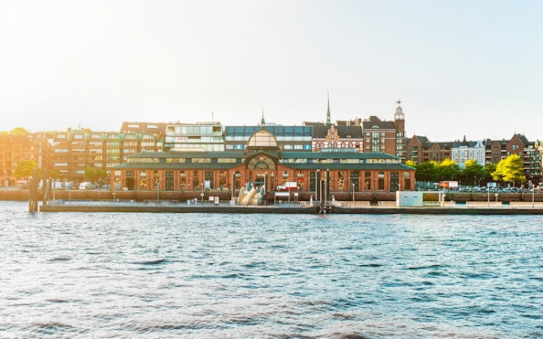 Hamburg Fish Market building viewed from the water during the 2-hour Hamburg Harbor Boat Tour.
