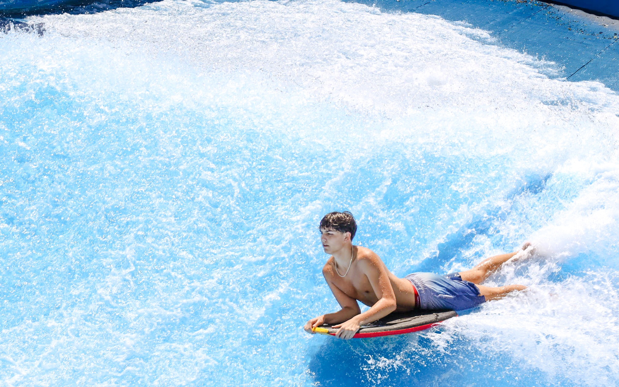 Person surfing on Boogie Bahn ride at Schlitterbahn New Braunfels.