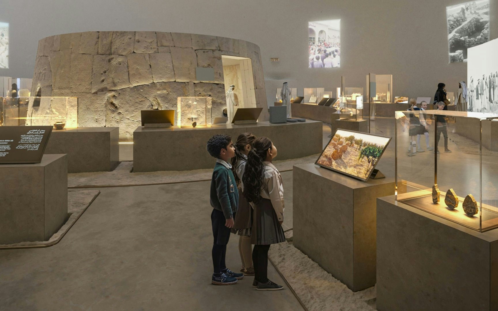 Kids observing exhibits at Zayed National Museum.
