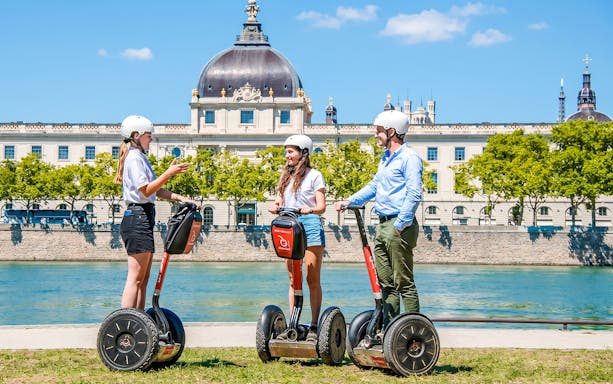 Segway riders in front of the Palais de Justice on a Lyon City Tour.