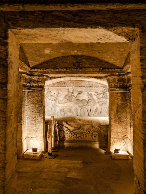 Ancient Egyptian tomb with intricate carvings and hieroglyphs in Cairo.