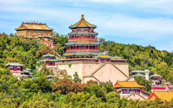Longevity Hill with Tower of Fragrance of Buddha, Summer Palace, Beijing, surrounded by lush greenery.