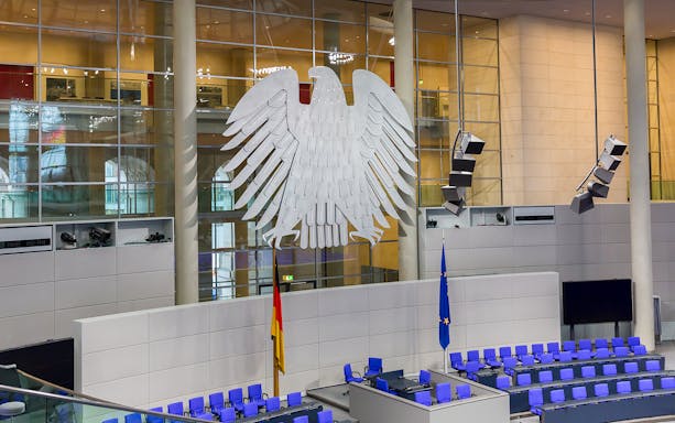 Reichstag Building interior with German eagle emblem, Berlin government district.
