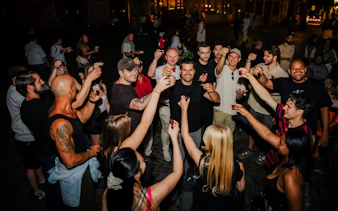 Group enjoying shots during Berlin nightlife tour with club entry.