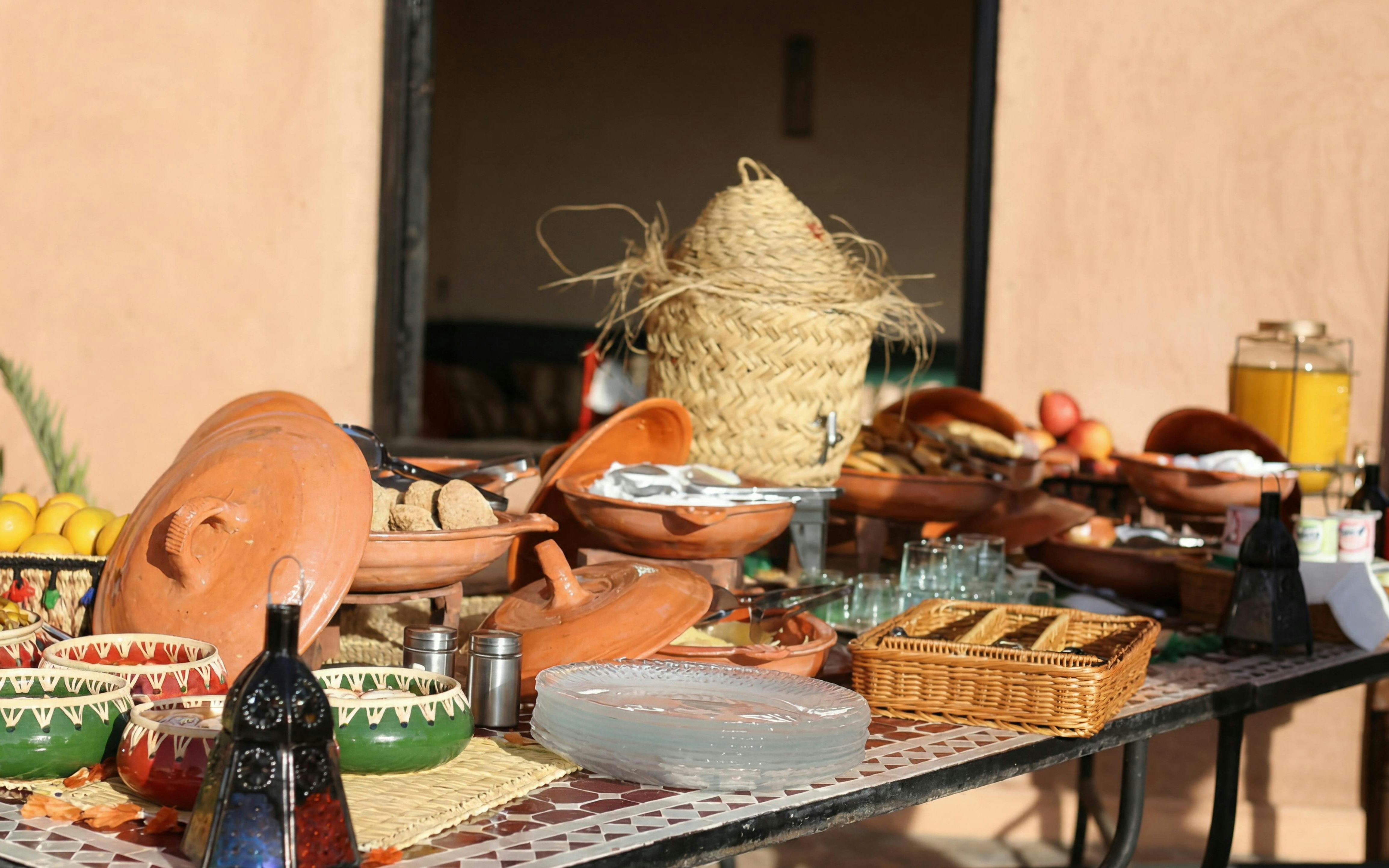 Berber breakfast spread with traditional Moroccan dishes in Marrakech.