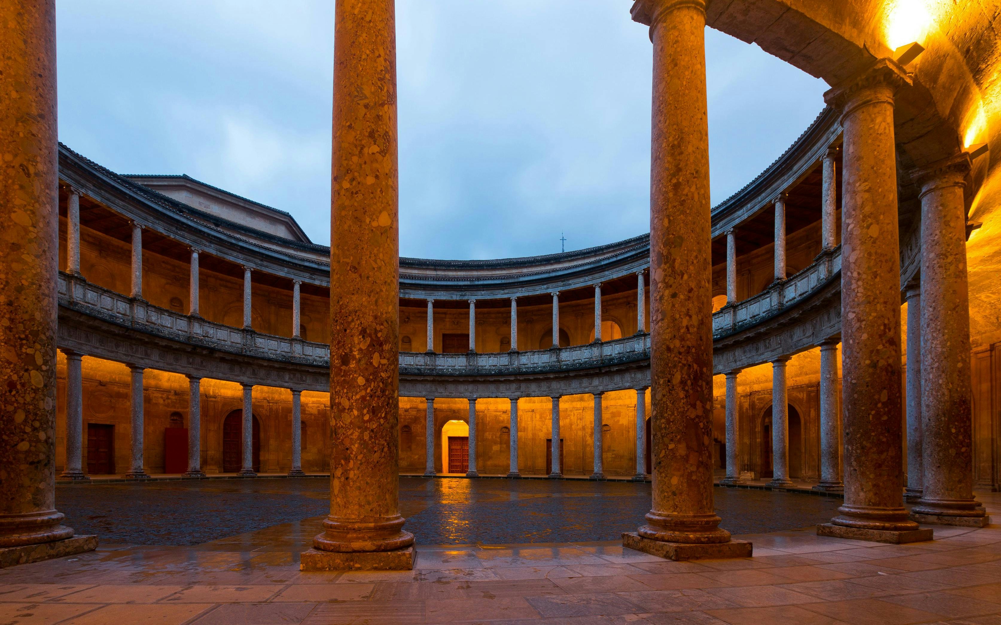 Courtyard of Palace of Charles V with stone columns at Alhambra, Granada.