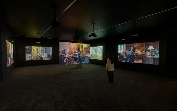 Visitor viewing Ragnar Kjartansson's Mercy exhibition at National Gallery of Victoria.