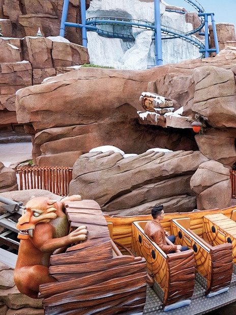 People enjoying a themed ride at Genting SkyWorld Outdoor Theme Park.