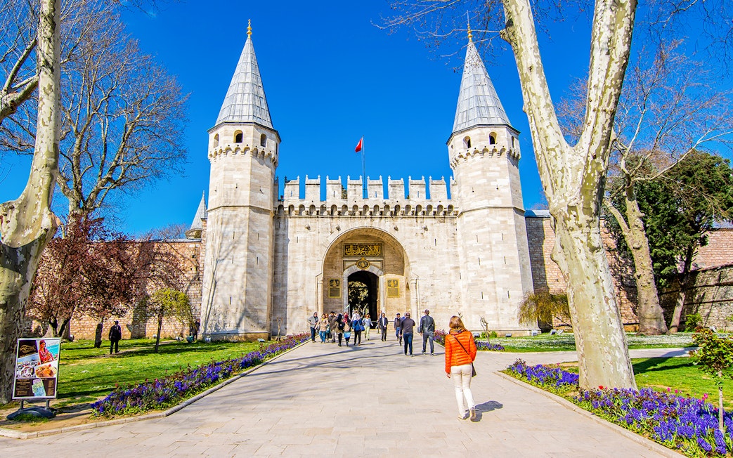 Visitors entering the Gate of Salutation at Topkapi Palace, Istanbul.