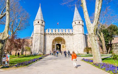 Visitors entering the Gate of Salutation at Topkapi Palace, Istanbul.