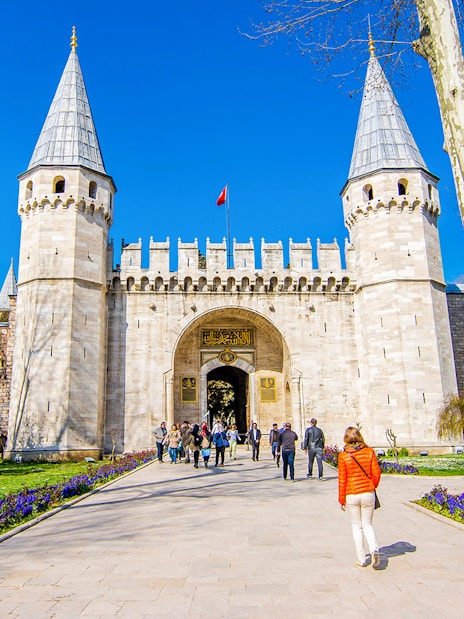 Visitors entering the Gate of Salutation at Topkapi Palace, Istanbul.