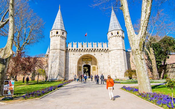 Visitors entering the Gate of Salutation at Topkapi Palace, Istanbul.