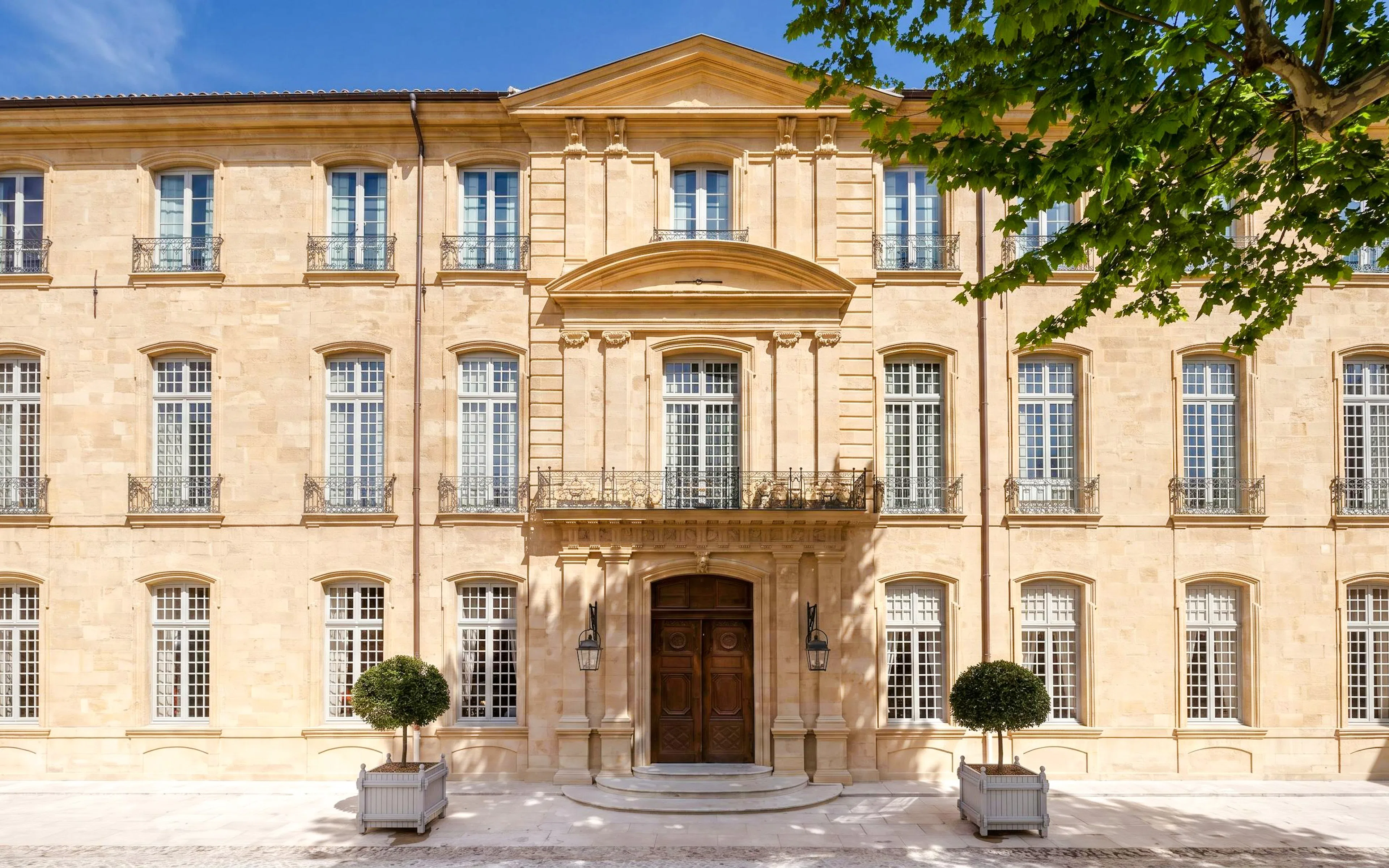 Caumont Centre d’Art facade in Aix-en-Provence, France, with classic architecture.