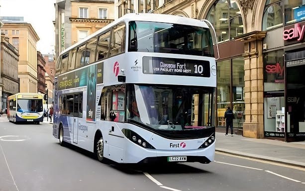 Double-decker bus on Glasgow street, route to city center from airport.