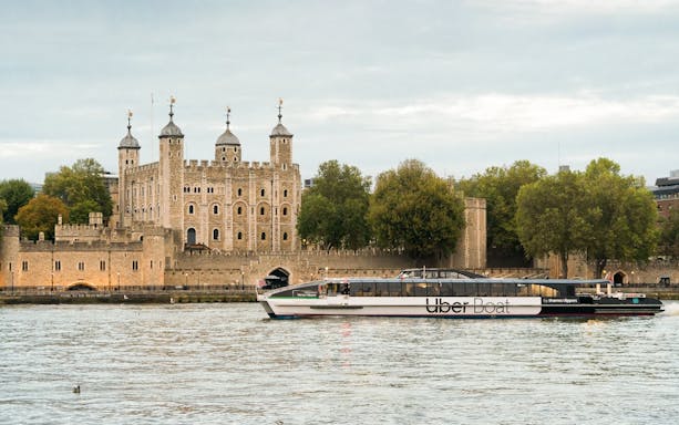 Uber Boat on the Thames near the Tower of London, England.