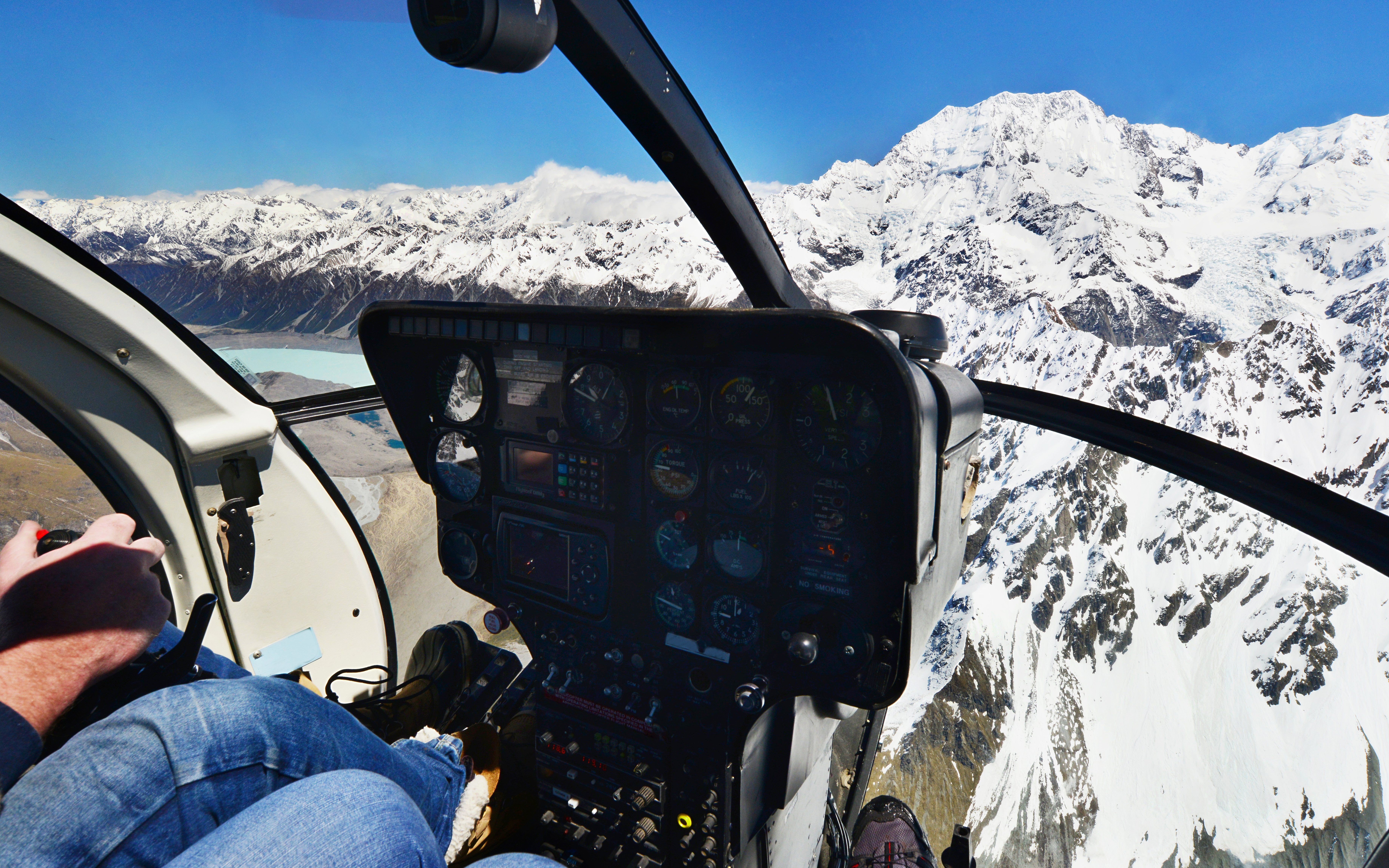 Helicopter cockpit view over Franz Josef Glacier, Westland, New Zealand.