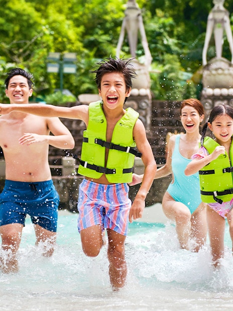 Guests enjoying the wave pool at Adventure Cove Waterpark™.