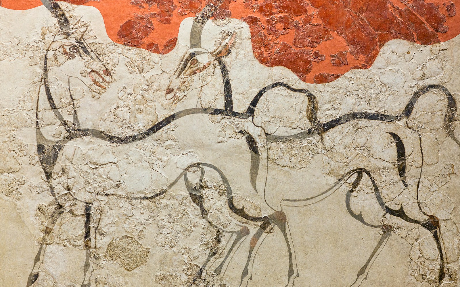 Ancient fresco with wild antelopes from palace of Minoan Settlement at Akrotiri, located on the Santorini island, Cyclades, Greece