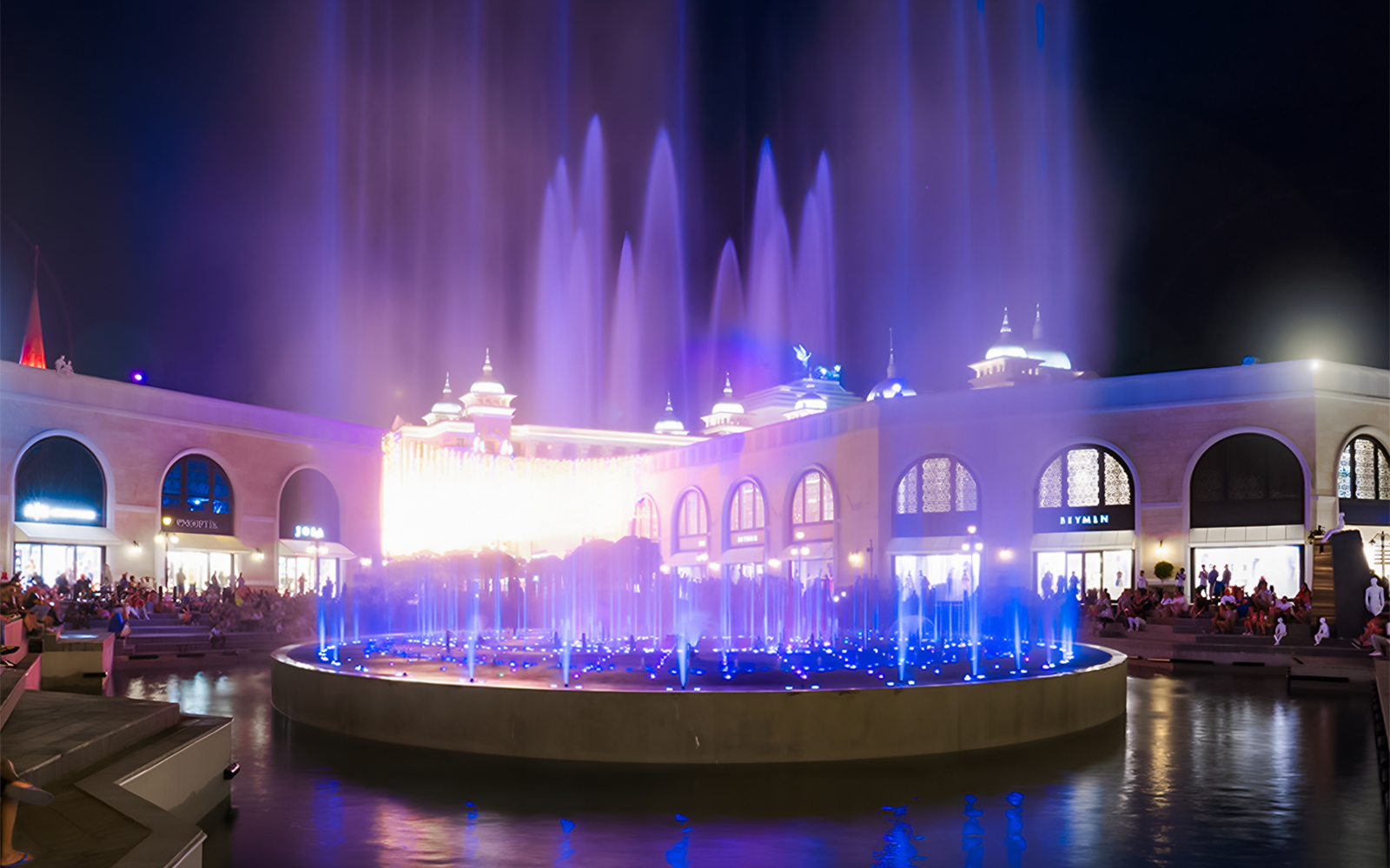 Chimera Fountain Show at Land of Legends, vibrant night water display.