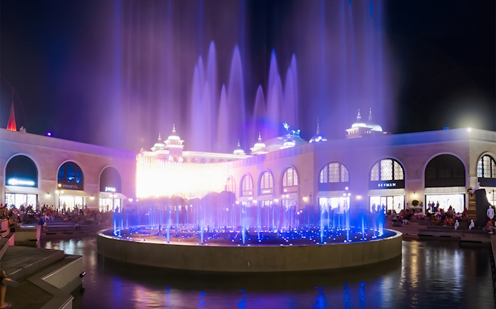 Chimera Fountain Show at Land of Legends, vibrant night water display.