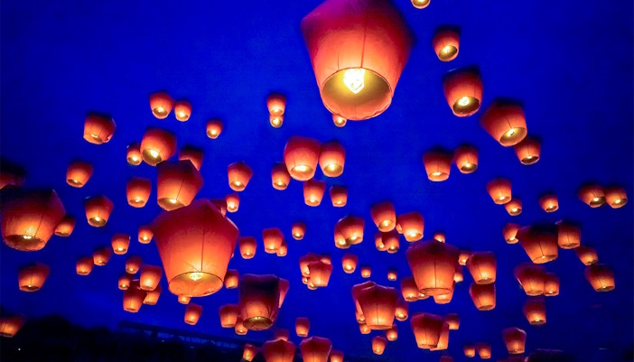 Taiwan Lantern Festival vibrant lantern displays illuminating the night sky in February.