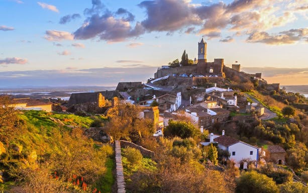 Medieval village of Monsaraz in Alentejo, Portugal, with castle and scenic landscape.