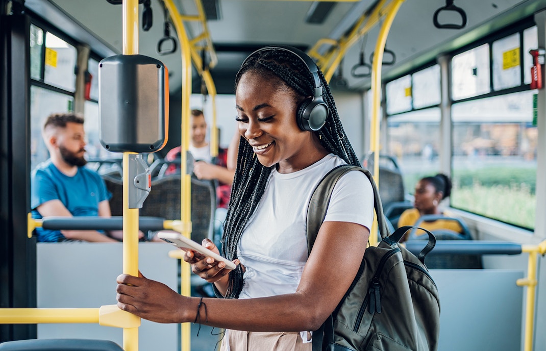 girl in the bus listening to music