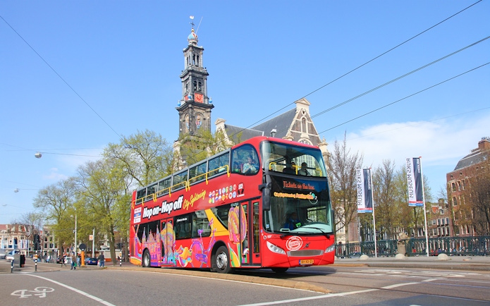 Hop on hop off bus in front of Westerkerk, Amsterdam.