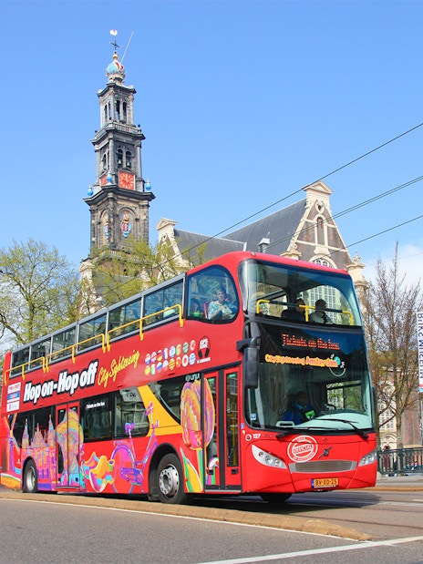 Hop on hop off bus in front of Westerkerk, Amsterdam.