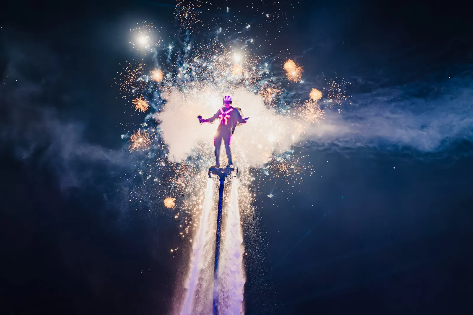 Flyboard performance with fireworks at Phu Quoc's Symphony of the Sea event.