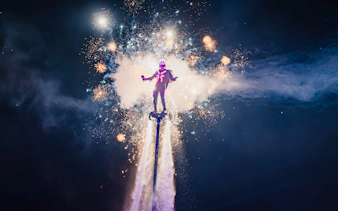 Flyboard performance with fireworks at Phu Quoc's Symphony of the Sea event.