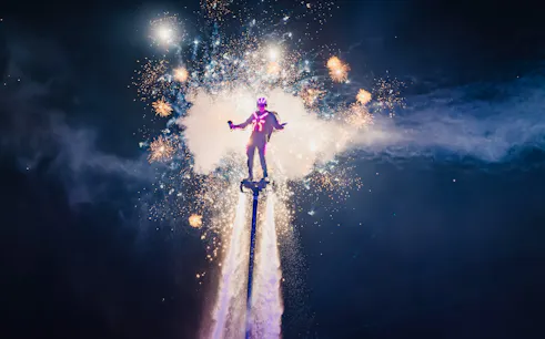 Flyboard performance with fireworks at Phu Quoc's Symphony of the Sea event.