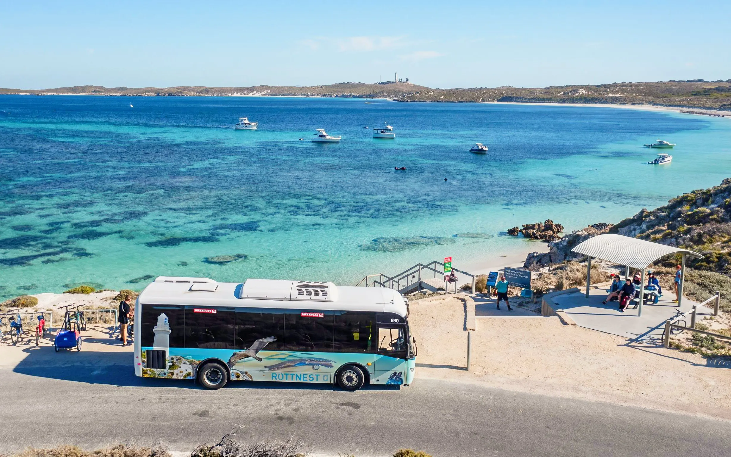 Ferry bus at Rottnest Island with view of turquoise waters and boats in Hillarys.