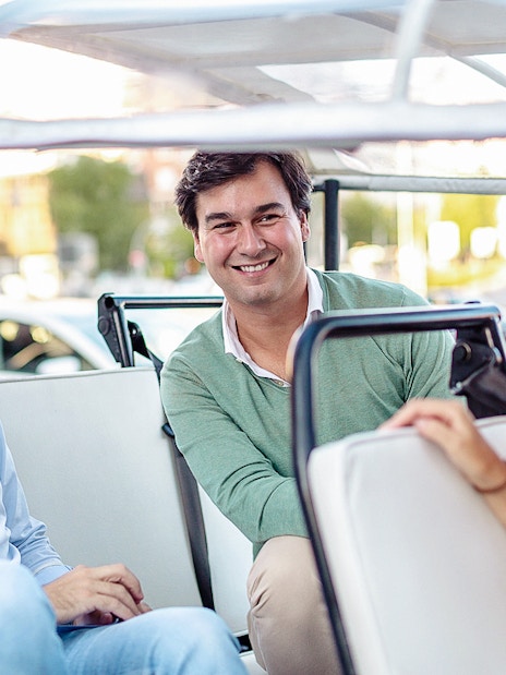 Group enjoying a ride in an Eco Tuk Tuk.