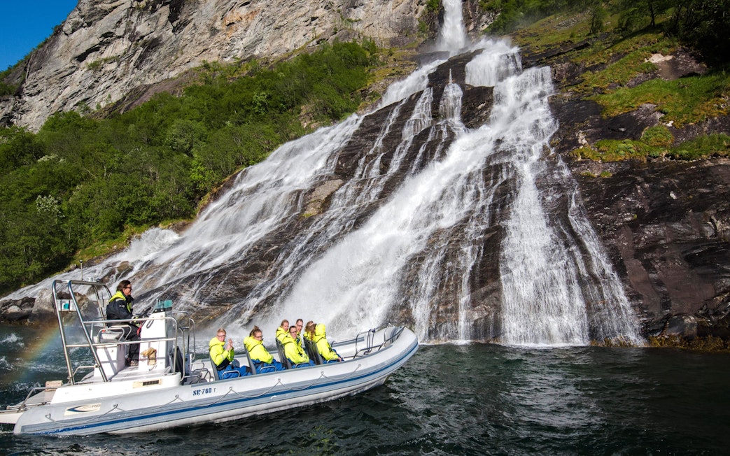RIB boat near Seven Sisters waterfall, Geiranger Fjord safari.