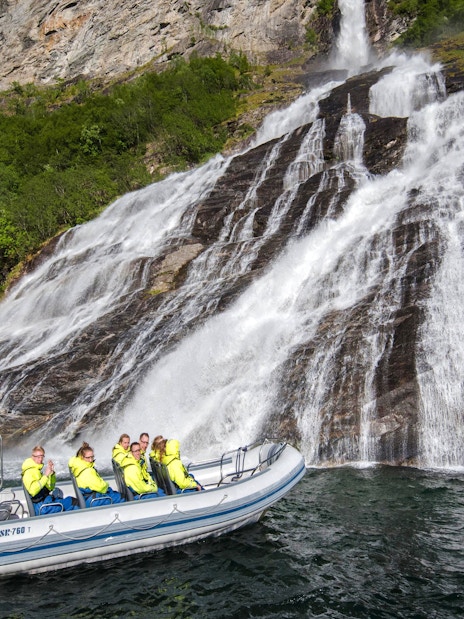 RIB boat near Seven Sisters waterfall, Geiranger Fjord safari.