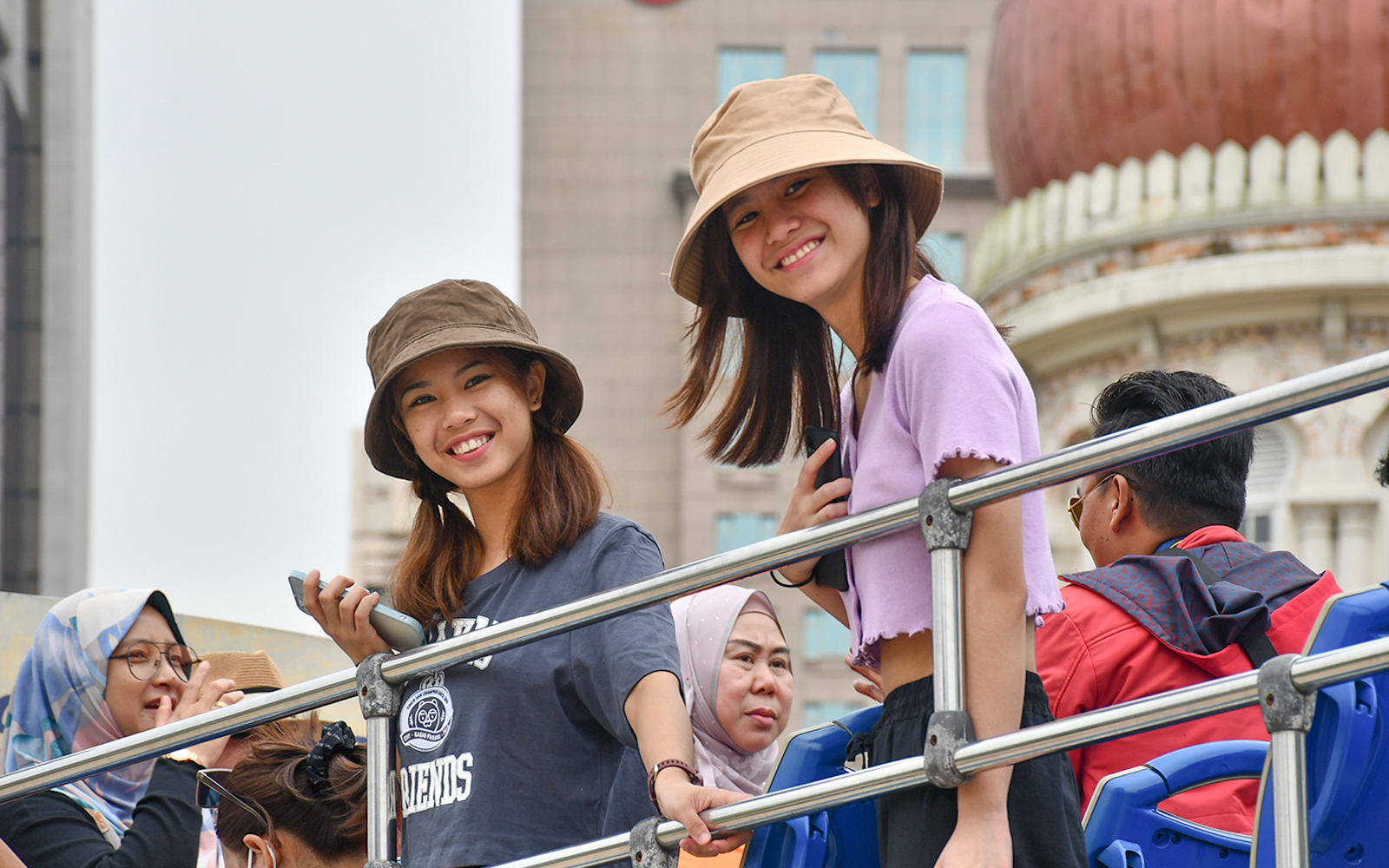 Passengers enjoying the Hop-On Hop-Off Tour in Kuala Lumpur.