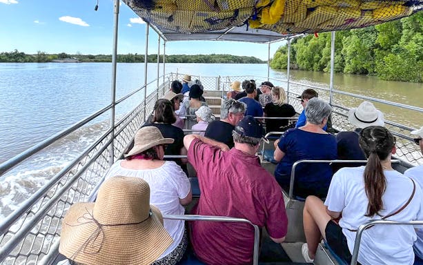 Tourists on a riverboat during the Jumping Crocodiles & Wildlife Tour.