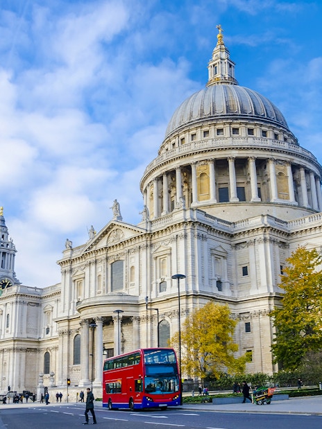 St Paul's Cathedral exterior with red double-decker bus, London.