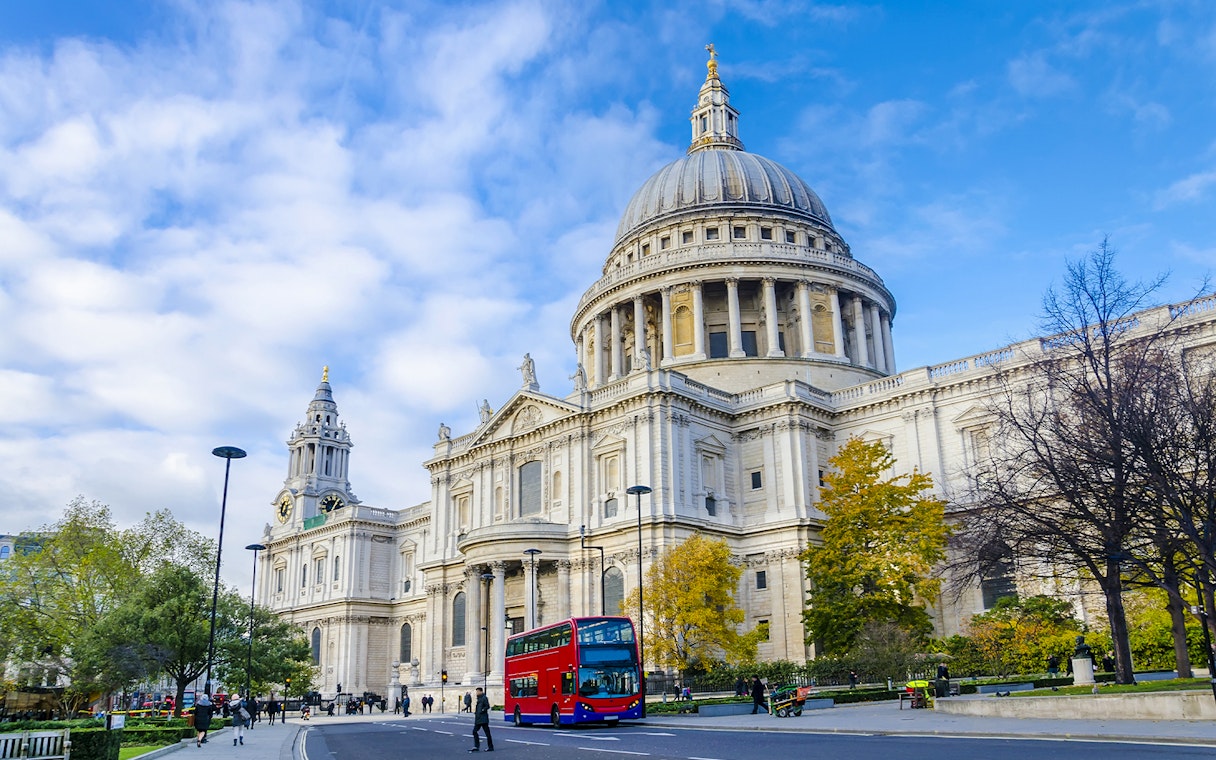 St Paul's Cathedral exterior with red double-decker bus, London.