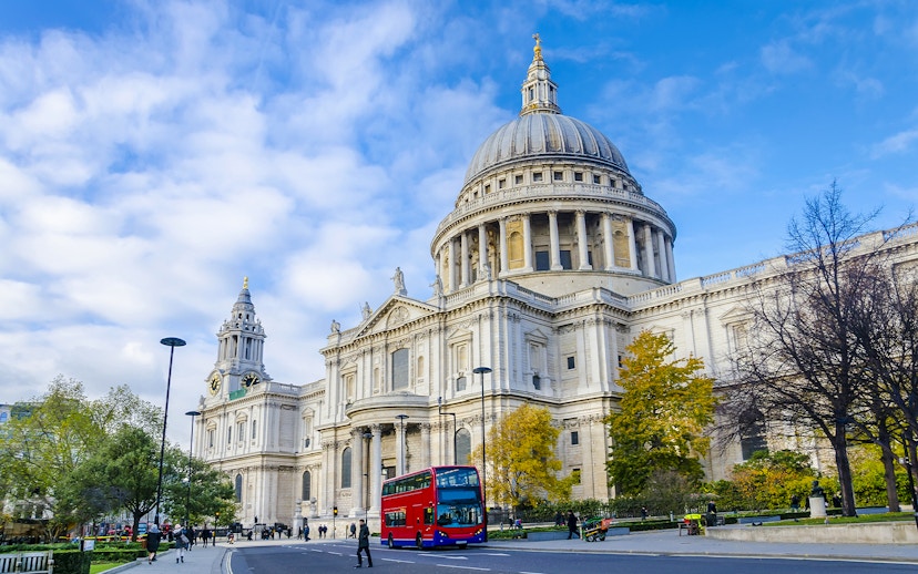 St Paul's Cathedral exterior with red double-decker bus, London.