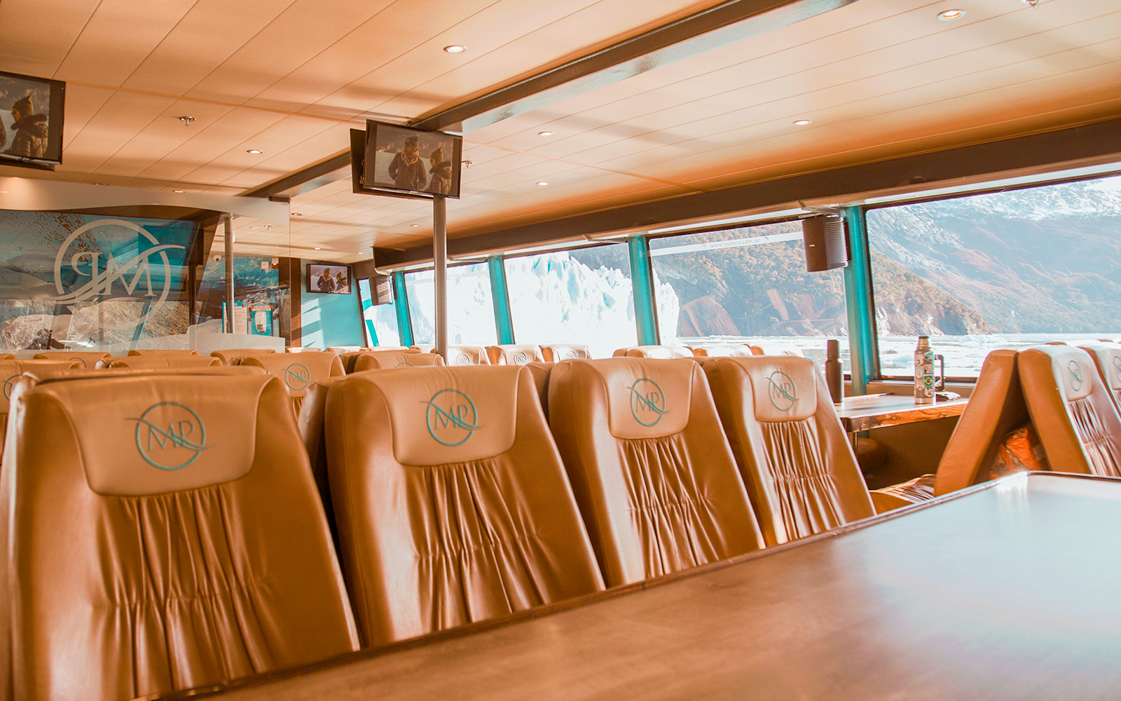 Interior seating of boat for Perito Moreno, Spegazzini & Upsala tour with glacier view.
