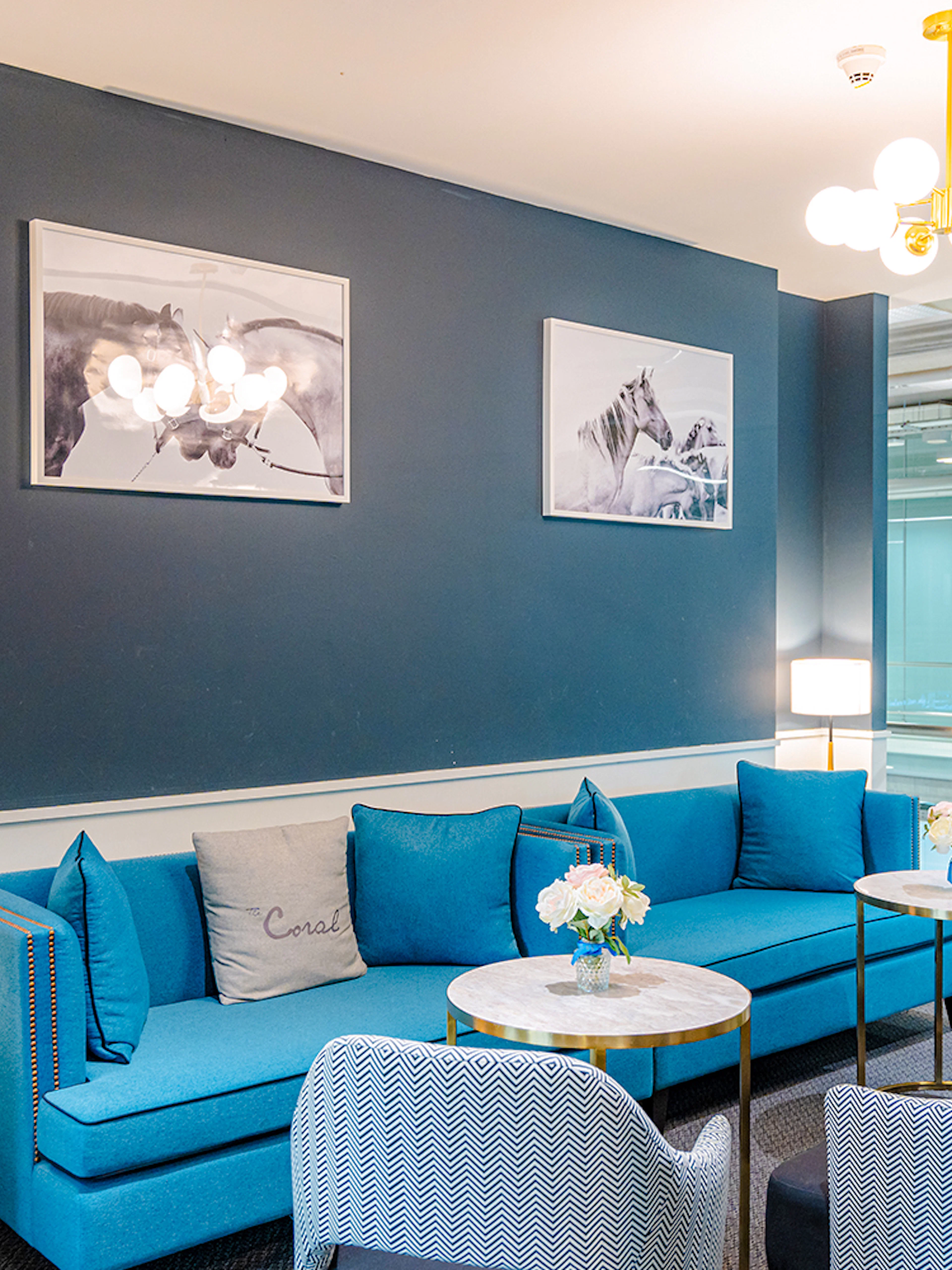 Business class lounge seating area at Coral Lounge, Bangkok airport, Thailand.