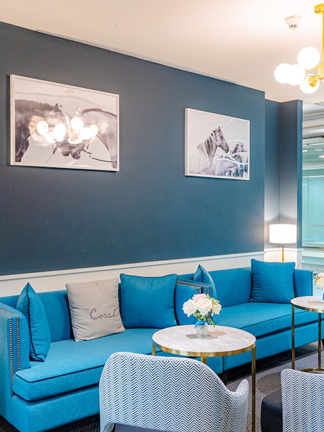 Business class lounge seating area at Coral Lounge, Bangkok airport, Thailand.