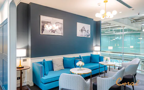 Business class lounge seating area at Coral Lounge, Bangkok airport, Thailand.