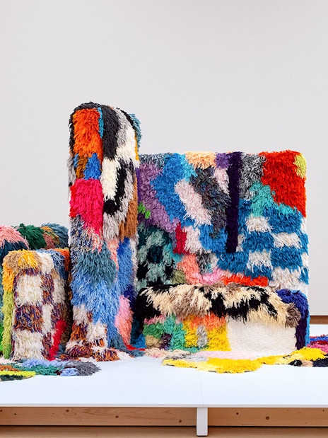 Colorful textile art installation by Sarah Zapata at Stedelijk Museum.