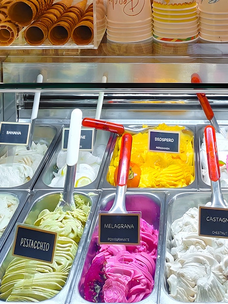 Gelato display with various flavors in Florence food tour.